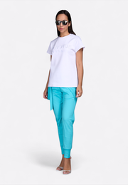 Model wearing EV embroidered white T-shirt, front view – East Vibe